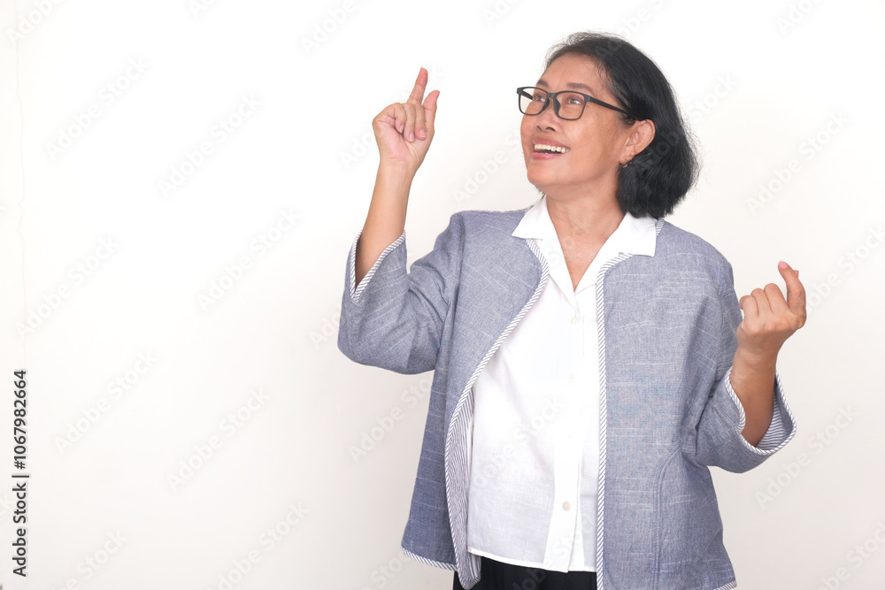 Asian businesswoman excitedly updating her team about the successful sales of the month Asian businesswoman excitedly updating her team about the successful sales of the month
