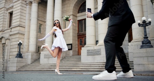 Wedding, picture and couple in city excited at marriage ceremony, celebration and court certificate. Photograph, pose and man and woman for memory in town for commitment, partnership and promise