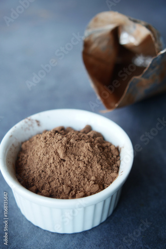 coco powder in a bowl on table,