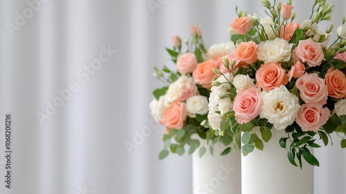 Large floral arrangements in soft blush and cream tones on pedestals lining the aisle, luxury wedding decor, creating a timeless aesthetic