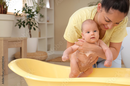 Beautiful young happy mothe...