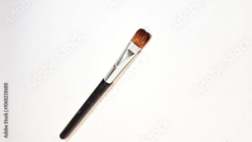 Isolated of used eyebrow pencil black color with white color background. used for drawing eyebrows on women. Brush for eyebrow.