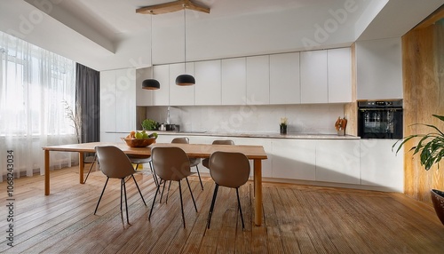 Modern kitchen interior with white walls, a wooden parquet floor and white countertops. A long table with chairs near it.