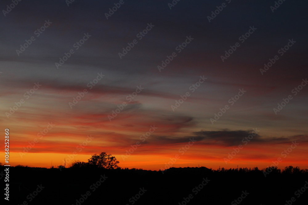 Fototapeta premium Red sky over the horizon after sunset.