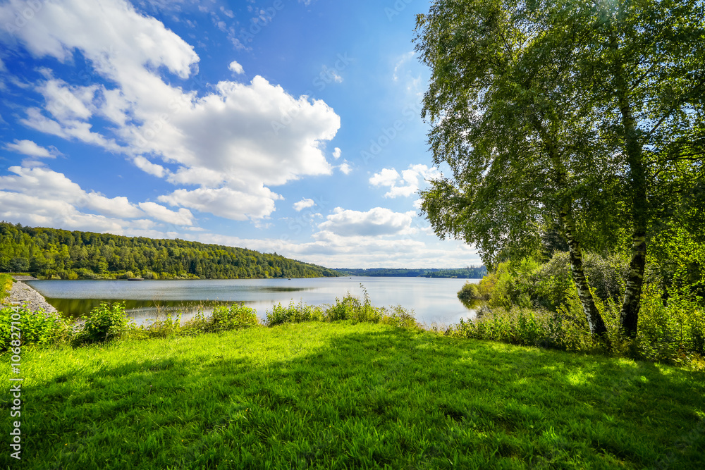View of the Aabach dam and the surrounding landscape. Nature at the drinking water dam in North Rhine-Westphalia near Bad Wünnenberg.
View of the Aabach dam and the surrounding landscape. Nature at the drinking water dam in North Rhine-Westphalia near Bad Wünnenberg.