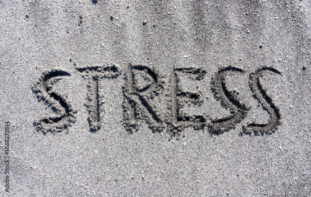 lifestyle and stress concept. Concept word Stress written on beautiful ocean sand beach. Beautiful ocean sand beach background, copy space. Medical and psychology stress concept. lifestyle and stress concept. Concept word Stress written on beautiful ocean sand beach. Beautiful ocean sand beach background, copy space. Medical and psychology stress concept.