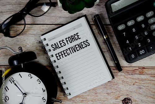 Sales Force Effectiveness (SFE) text on notepad, Business and Financial concept background photo