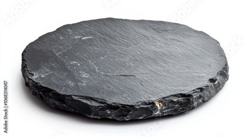 Round rustic black slate stone plate, isolated on white background