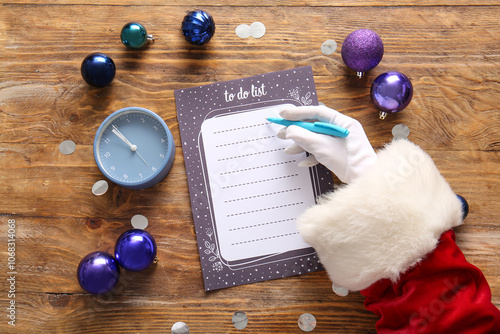 Santa Claus writing to-do l...