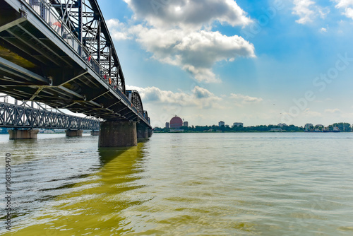 Tableau sur toile The steel bridge connecting the Yalu River in China to North Korea