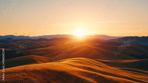 Tranquil Sunset Over Rolling Hills and Wind Farms