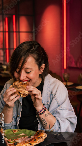 girl eating pizza in funny attitude