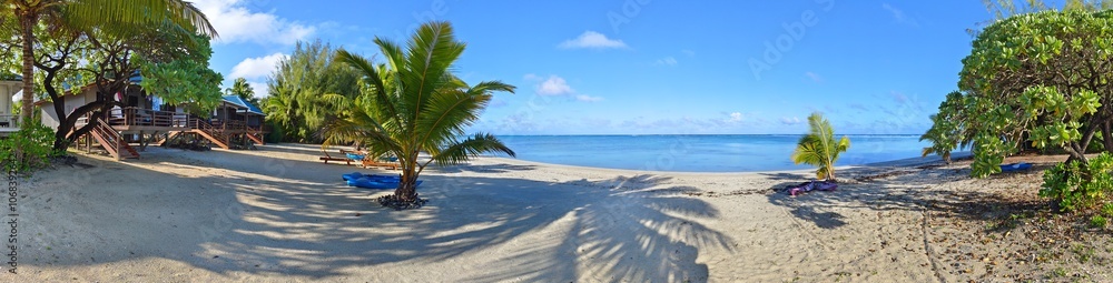 Beautiful beach with palm trees on Aitutaki Island, Cook Islands. Panorama. Beautiful beach with palm trees on Aitutaki Island, Cook Islands. Panorama.