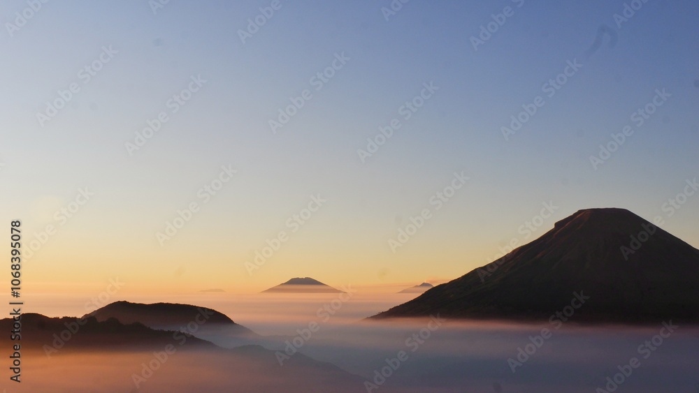 Dieng plateau. View of Dieng plateau in sunrise moment and in bluesky. The highest plateau island in Java, Indonesia. Dieng plateau. View of Dieng plateau in sunrise moment and in bluesky. The highest plateau island in Java, Indonesia.