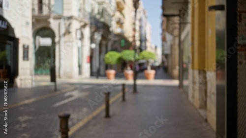 Defocused view of a vibrant outdoor urban street with blurred background, showing pedestrians walking amidst historic buildings and planters, capturing the essence of a lively urban scene