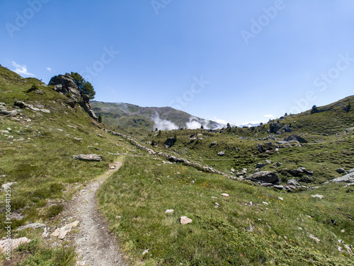Hiking Karspitze one of the peaks on Nordkette mountain range in Tyrol, Austria in summer