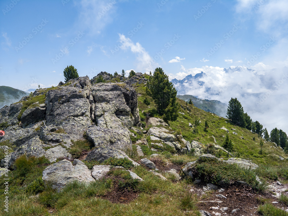 Hiking Karspitze one of the peaks on Nordkette mountain range in Tyrol, Austria in summer Hiking Karspitze one of the peaks on Nordkette mountain range in Tyrol, Austria in summer