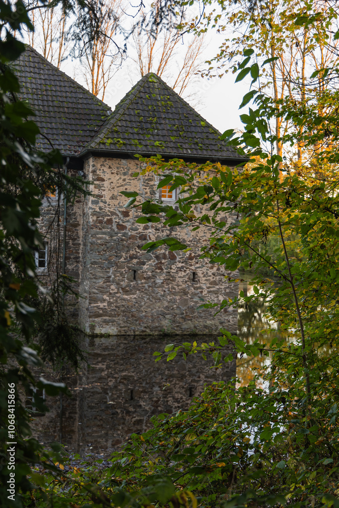 Old stone mill on the bank of a river in autumn, Old stone mill on the bank of a river in autumn,