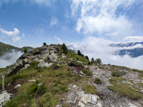Hiking Karspitze one of the peaks on Nordkette mountain range in Tyrol, Austria in summer