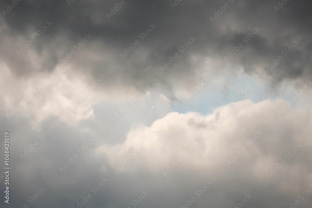 View of the Sky Before the Rain covered with dark clouds, a sign of impending rain View of the Sky Before the Rain covered with dark clouds, a sign of impending rain