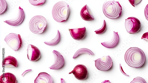Sliced red onions pattern on white background: vibrant and fresh culinary ingredient