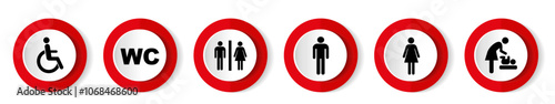 Signs indicating various restroom facilities in a public area, including accessible options, located in a city park