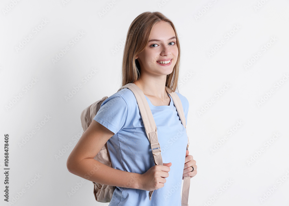 Teenage girl with backpack on white background Teenage girl with backpack on white background