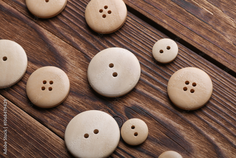 Wooden buttons on a wooden background Wooden buttons on a wooden background