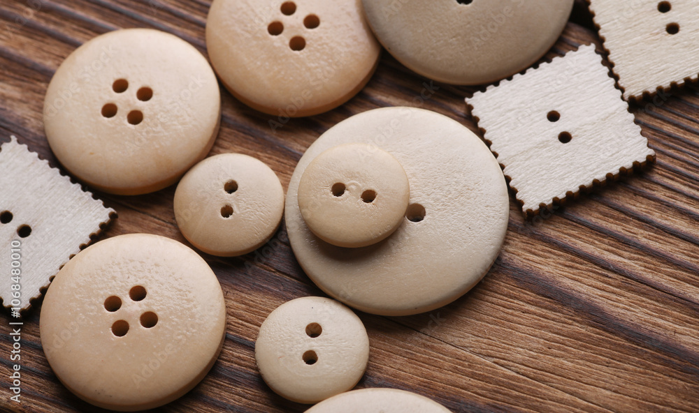 Wooden buttons on a wooden background Wooden buttons on a wooden background