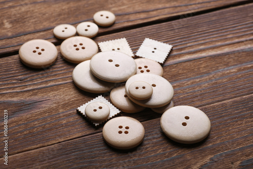 Wooden buttons on a wooden background