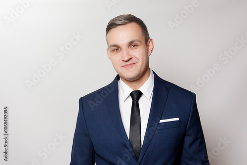 Portrait of handsome man in black blue suit