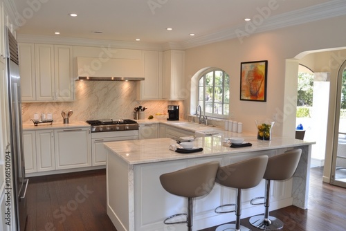 Modern White Kitchen with Marble Island and Bar Stools