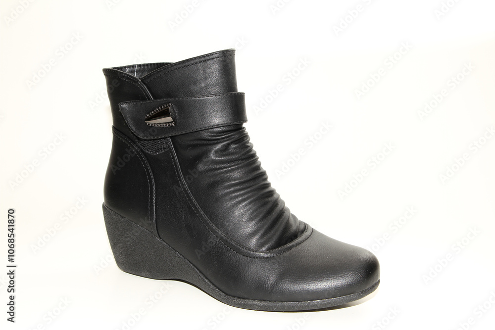 Women's Winter Boots and Shoes. On a white background. Side view. Unbranded model. Women's Winter Boots and Shoes. On a white background. Side view. Unbranded model.