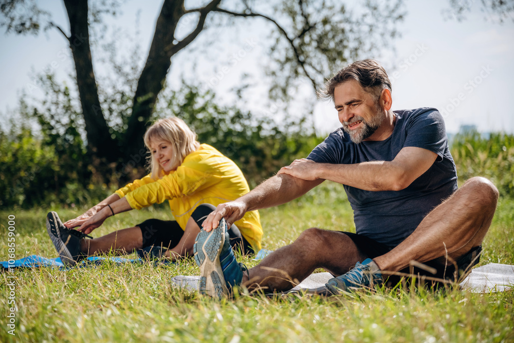 The fitness weekend. Senior couple together outdoors at nature The fitness weekend. Senior couple together outdoors at nature