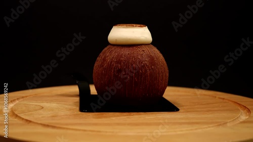 coconut mini cake, Petit Gateau on a wooden plate