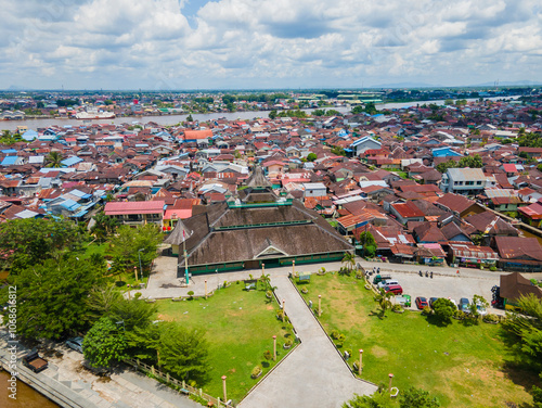 Aerial view of Jami Mosque of Pontianak, also known as Sultan Syarif Abdurrahman Mosque, is the oldest mosque of Pontianak, in West Kalimantan, Indonesia. Located in the bank of Kapuas River. photo