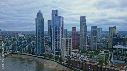 St George Wharf Tower or Vauxhall Tower residential skyscraper in Vauxhall, London. Aerial drone backward photo