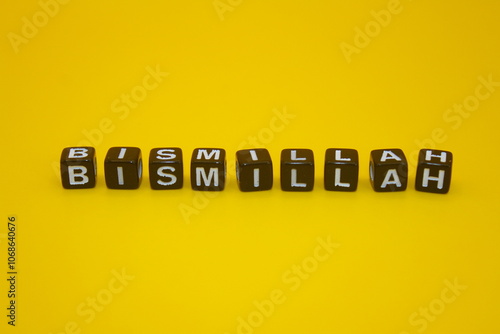 yellow background with the words bismillah