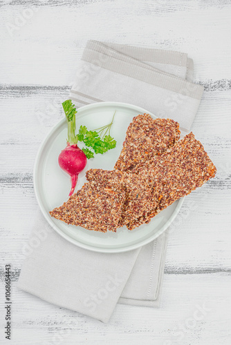 Flourless seed bread with radish and parsley. Vegan healthy eating concept, ready to eat food photo