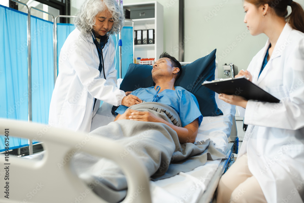 Fototapeta premium doctor talking to male patient at bed in hospital.