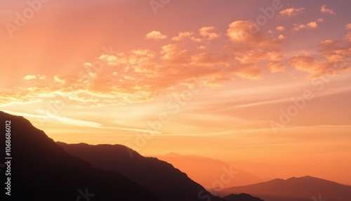 mountains with a sunset in the background