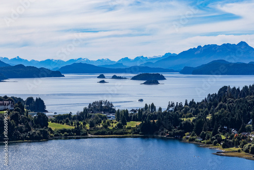 High angle view of mountain lakes and forests on summer day photo