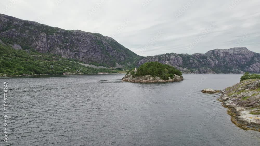 Drone Flight Over Water With Rugged Rocky Mountains In View Drone Flight Over Water With Rugged Rocky Mountains In View