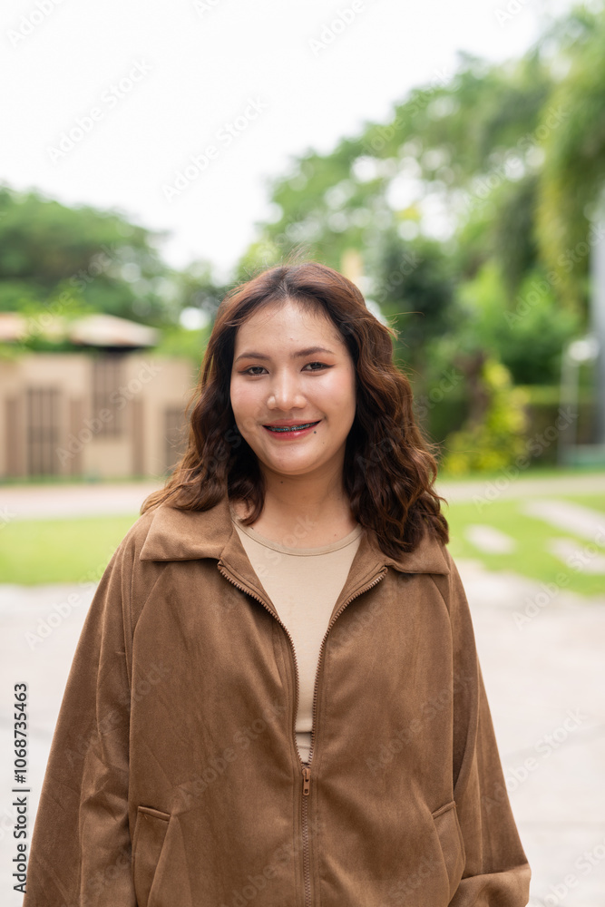 Portrait of Beautiful And Young Cute Asian Woman Outdoors Portrait of Beautiful And Young Cute Asian Woman Outdoors
