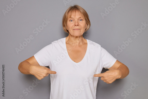 Wallpaper Mural Caucasian Senior confident woman pointing proudly at herself celebrating success feeling victorious looking serious and arrogant isolated over gray background Torontodigital.ca