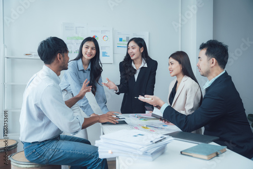 Collaborative Brainstorming: A diverse team of business professionals engaged in a lively discussion, sharing ideas and insights during a brainstorming session.