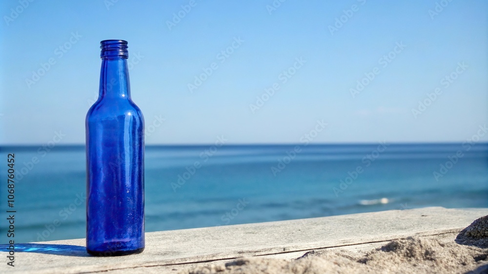 Against a serene blue expanse, a sturdy blue glass bottle appears as a sturdy sentinel, its simple form and color providing a sense of balance to the surrounding environment, Against a serene blue expanse, a sturdy blue glass bottle appears as a sturdy sentinel, its simple form and color providing a sense of balance to the surrounding environment,