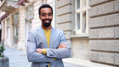 Portrait of an elegant man enjoying downtown