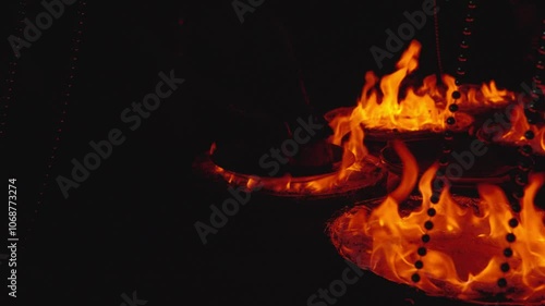 The chef serves a signature dish - Shah pilaf baked in dough. The presentation is accompanied by a spectacular fire show with national Azerbaijani music. photo