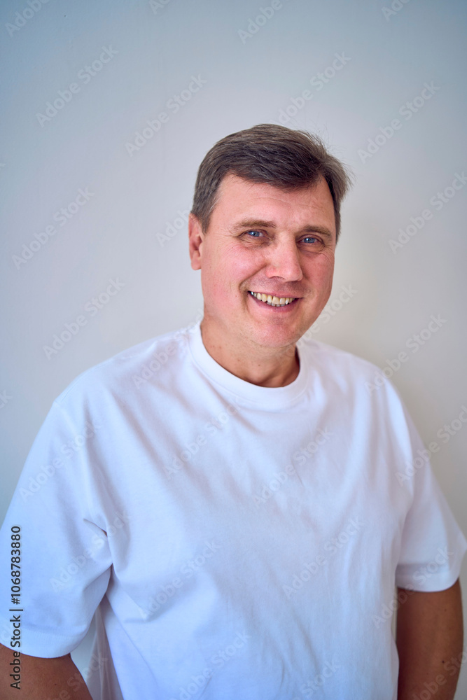 Fototapeta premium portrait of a middle-aged man on a white background